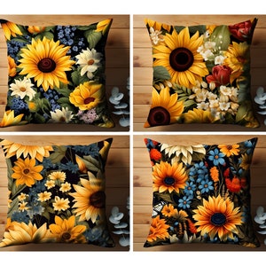 Puede incluir: Cuatro almohadas cuadradas con un patr&oacute;n floral que presenta girasoles, flores azules y amarillas y hojas verdes sobre un fondo negro.