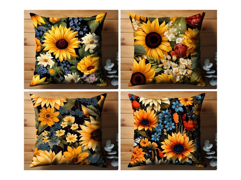 Puede incluir: Cuatro almohadas cuadradas con un patr&oacute;n floral que presenta girasoles, flores azules y amarillas y hojas verdes sobre un fondo negro.