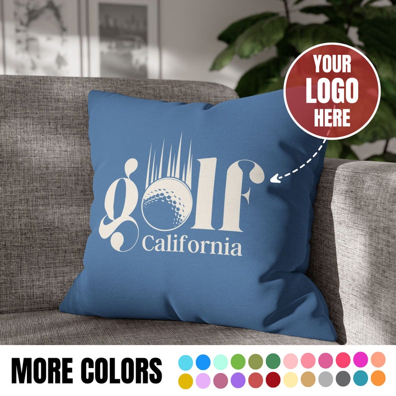 May include: Blue throw pillow with white text that says "golf California" and a white golf ball graphic. The pillow is on a gray couch. A red circle with white text that says "Your Logo Here" is in the upper right corner of the image.