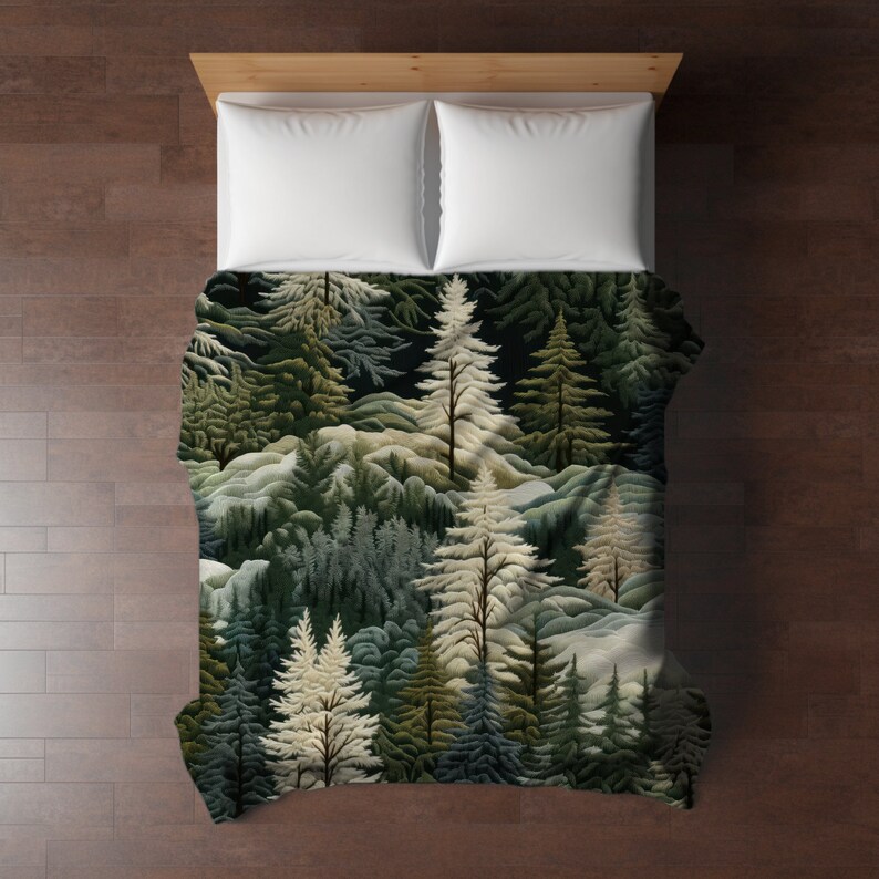 May include: A dark green and white patterned duvet cover with a forest scene featuring pine trees. The duvet cover is made of soft, comfortable fabric and is perfect for adding a touch of nature to your bedroom.