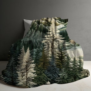 May include: A soft, plush throw blanket featuring a forest scene with a variety of green, blue, and white trees. The blanket is made of a soft, fuzzy material and is perfect for adding a touch of nature to your home.