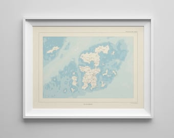 May include: A framed vintage map of the Isle of Man, printed on a light blue background with white lines and text. The map is framed in a white frame.