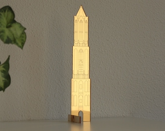 Dom Tower Utrecht made of gold plexiglass and with a wooden base - Light catcher of the Dom of Utrecht for your windowsill.