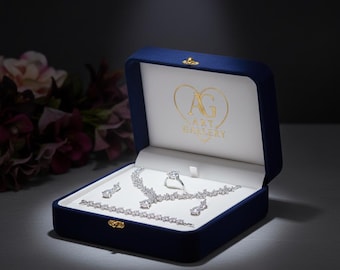 Set di gioielli da sposa in argento sterling: collana, orecchini, bracciale e anello con zirconi cubici
