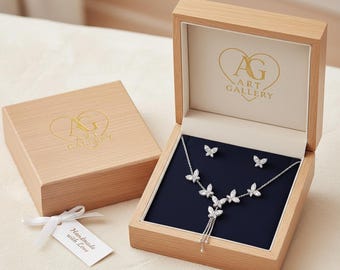 Conjunto de collar y pendientes de mariposa de plata de ley: joyería de circonitas cúbicas
