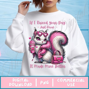 May include: A white sweatshirt with a pink and white cartoon squirrel wearing sunglasses and holding a pink drink. The text on the sweatshirt reads "If I ruined your day. Just know. It made mine better."