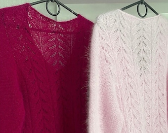 Knitting pattern for a pullover with an openwork back, knitted with needles and a V-neck raglan shoulder strap. Sizes: XS/S, M/L, XL/XXL