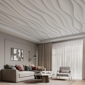 May include: A contemporary living room with a light grey sectional sofa, decorative cushions, a round coffee table, and a grey armchair. The ceiling has a distinctive wave pattern. Neutral curtains and an abstract artwork complete the room's design.