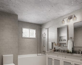 May include: A modern bathroom with a white bathtub, a shower stall, and a double vanity with white cabinets and a gray countertop. The bathroom has a gray tiled floor and a gray tiled wall. There are two light fixtures with clear glass globes.