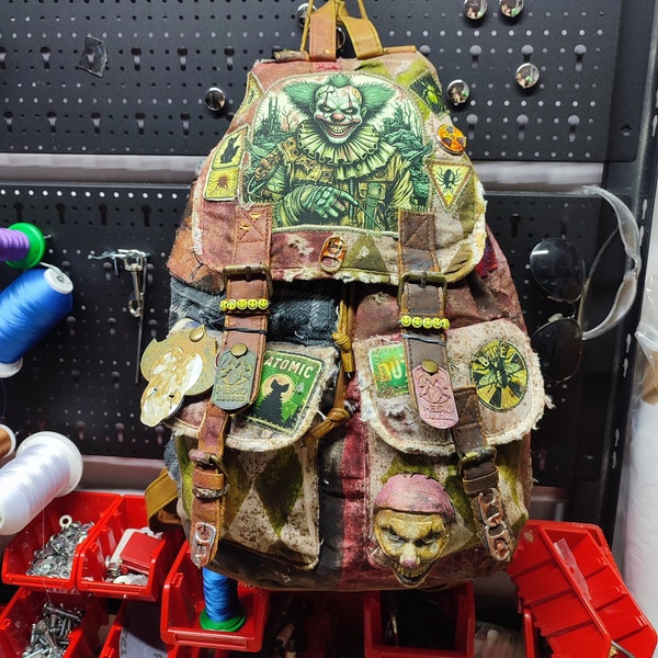 Postapocalyptic style backpack creepy clown theme. Patches, soda caps, vintage style bag. Patchwork handmade, unique design. It fan