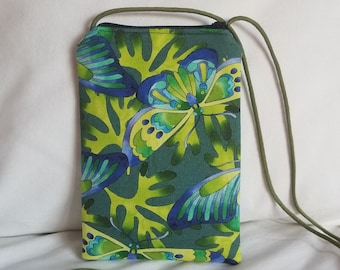 May include: A rectangular cell phone crossbody bag with a green and blue butterfly pattern. The bag has a green strap and a zipper closure. The background of the butterfly pattern is a bright green color.