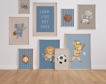 May include: A gallery wall set of eight framed prints featuring illustrations of animals playing sports, including a basketball-playing elephant, a football-playing rhino, and a baseball-playing giraffe, with text reading LONG LIVE BOY HOOD.
