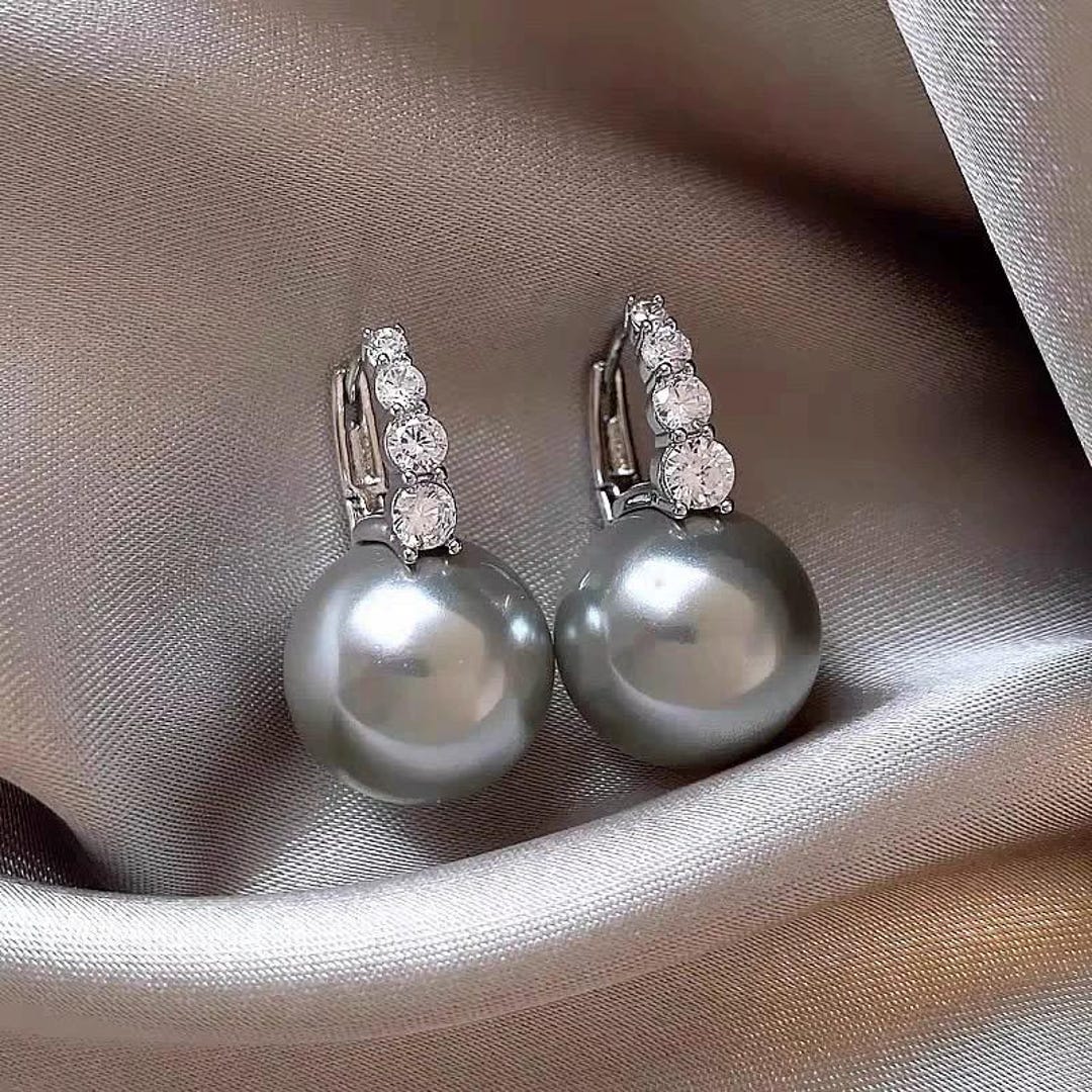 Pearl Earrings with Purple Zirconia