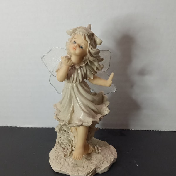 Pixi Fairy Girl Figurine Holding Flower Petals