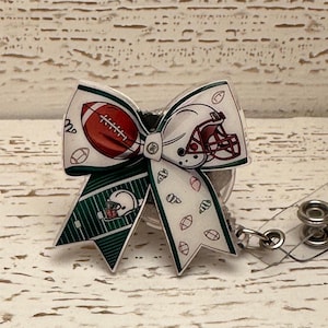 Football bow badge reel- football badge - bow badge - teacher - nurse - respiratory - MD - pharmacy - radiology
