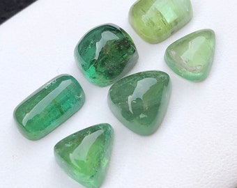 Natural Green Tourmaline Cabochons' Lot originated from Afghanistan.