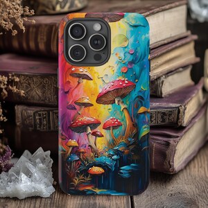May include: A colorful phone case with a psychedelic design featuring a field of mushrooms in various colors and sizes. The case has a cutout for the camera lens and a black background.