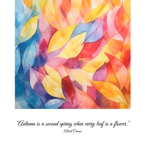 Op de afbeelding: Waterverf schilderij van kleurrijke bladeren in tinten blauw, geel, roze en rood. De quote "De herfst is een tweede lente wanneer elk blad een bloem is." van Albert Camus staat onder het schilderij.