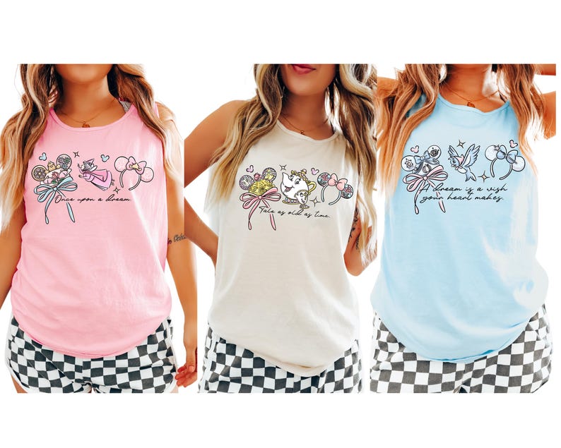 May include: Three tank tops in pink, cream, and light blue, each featuring a different Disney-themed graphic. The pink top has the text "Once upon a dream." The cream top says "Tale as old as time." The blue top reads "A dream is a wish your heart makes."