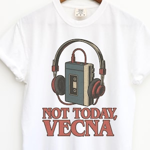 May include: White t-shirt with a retro design of a cassette player and headphones. The cassette player is blue and beige, with red accents on the headphones. The text "NOT TODAY, VECNA" is printed in red.