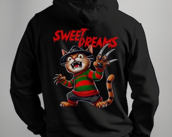 Puede incluir: Sudadera con capucha negra con un gato de dibujos animados disfrazado de Freddy Krueger, con sombrero, suéter a rayas y guante con garras. Las palabras "SWEET DREAMS" están impresas en rojo encima del gato.