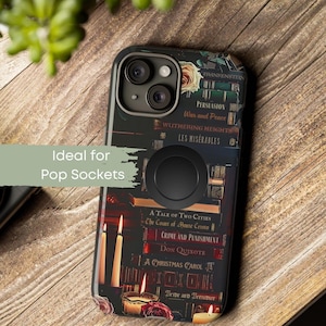 May include: Black phone case with a book-themed design featuring classic literature titles like "Frankenstein" and "Pride and Prejudice." The case includes a black pop socket and decorative candles and roses.