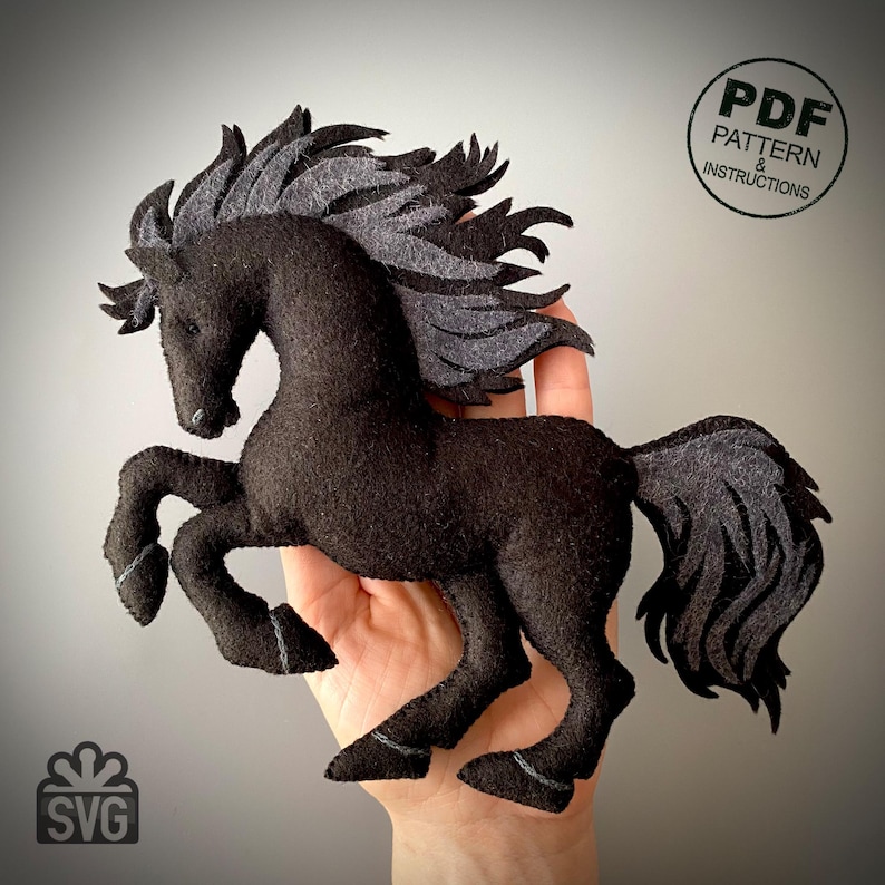 May include: A black felt horse with a gray mane and tail, posed mid-gallop. The horse is a handmade craft item, possibly a pattern or template, as indicated by the "PDF Pattern & Instructions" text in a circle. An SVG logo is also present.