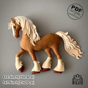 May include: A handcrafted felt horse in shades of brown and cream. The horse features a flowing cream mane and tail, with cream-colored leg coverings. The image includes the text "PDF Pattern & Instructions" and size details: 6x5.5 inches (15x14cm) and 8x7.6 inches (21x20cm).