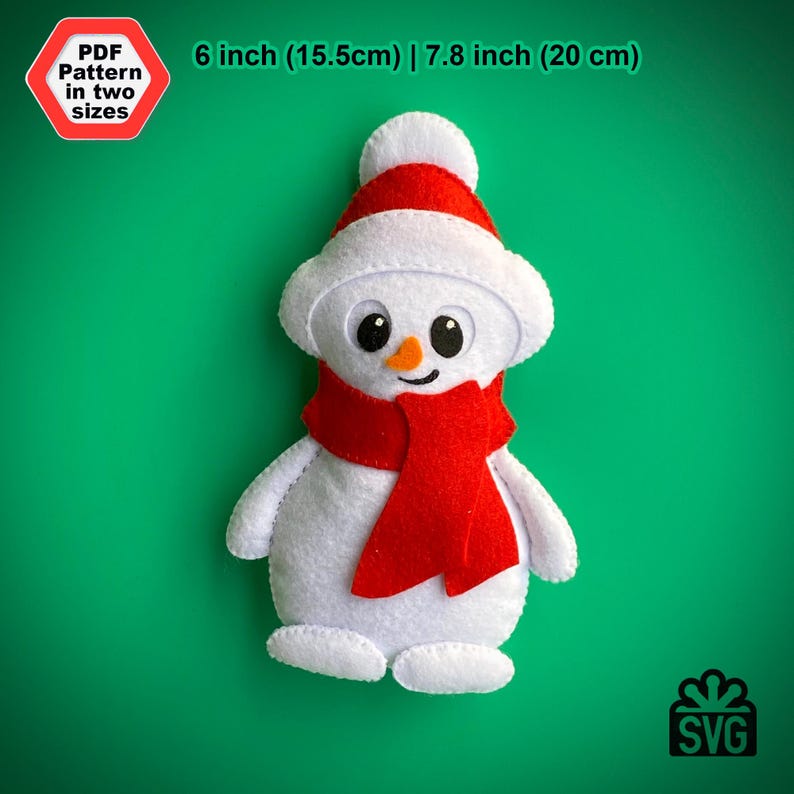 May include: A white felt snowman ornament with a red felt scarf and black button eyes. The snowman is 6 inches (15.5 cm) tall or 7.8 inches (20 cm) tall.  PDF and SVG patterns are available.