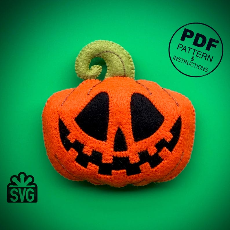 May include: A felt pumpkin with a carved jack-o'-lantern face. The pumpkin is orange with a green stem and black eyes, nose, and mouth. The image includes the text "PDF PATTERN & INSTRUCTIONS" and "SVG".
