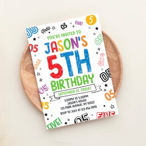 May include: A vibrant birthday invitation with the text "JASON'S 5TH BIRTHDAY" in multiple colours. The invitation includes the date, time, and location details, with star and "05" graphics scattered around the edges. The invitation is on a wooden plate.
