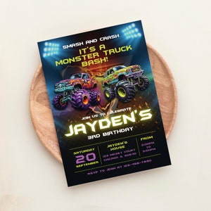 May include: A black and neon green monster truck birthday party invitation with a purple and green monster truck, a yellow and green monster truck, and the text "Smash and Crash It's a Monster Truck Bash! Join us to celebrate Jayden's 3rd Birthday. Saturday, September 20, Jayden's House, 129 Mickey Court, Chicago, IL 60640, From 3:00PM to 5:00PM, RSVP to Jean at 123-456-7890."