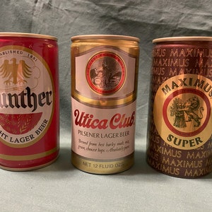 Variété de canettes de bière vintage des années 1970 des brasseurs new-yorkais.  Trois 12 oz. boîtes de conserve.