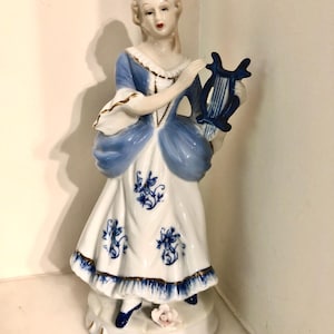 Vintage,ceramic, elegant lady holding a lyre  figurine