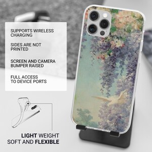 May include: A clear phone case with a floral design featuring a white bird flying through a purple and pink flower arrangement. The case has a raised bumper to protect the screen and camera. It supports wireless charging and has full access to device ports. The case is lightweight and flexible.