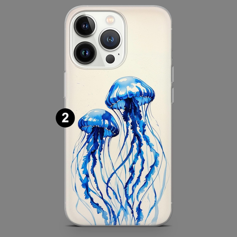 May include: A white iPhone case with a watercolor illustration of two blue jellyfish. The jellyfish have long, flowing tentacles.