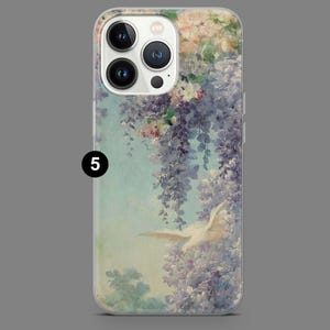 May include: A clear phone case with a floral design featuring a white dove flying through a field of purple and white flowers. The case has a camera lens cutout and a white background.
