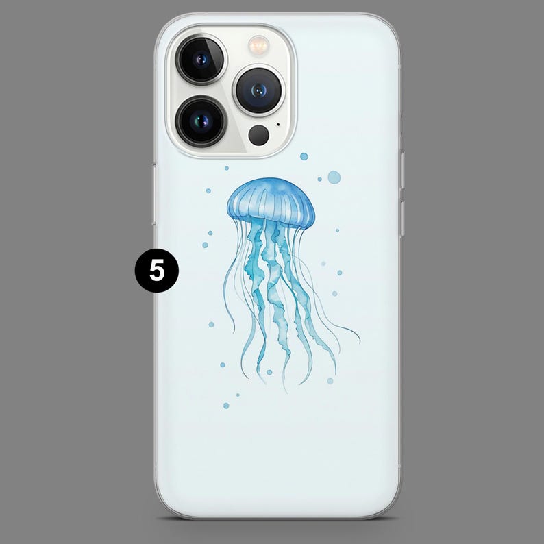 May include: A white iPhone case with a blue jellyfish illustration. The jellyfish is in the center of the case and has a light blue bell and long, flowing tentacles.