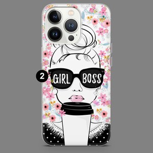 May include: A clear phone case with a floral pattern and a black and white illustration of a woman wearing sunglasses and holding a coffee cup. The text "GIRL BOSS" is printed on the sunglasses.