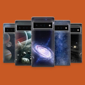 May include: Five different phone cases with a space theme. The cases feature images of planets, galaxies, and stars. The cases are all black and have a clear back.
