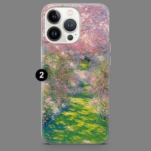 May include: A clear phone case with a colorful floral design. The design features a path through a garden with pink and purple flowers.