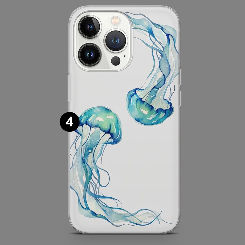 May include: A clear phone case with a design of two blue and green jellyfish. The jellyfish are in a watercolor style and have long, flowing tentacles.