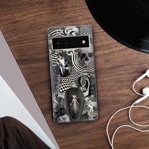 May include: A black and white phone case with a psychedelic design featuring swirling patterns, eyes, and a skull.