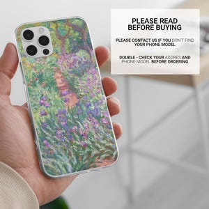 May include: A clear phone case with a colorful painting of a garden with purple flowers and a path. The text "PLEASE READ BEFORE BUYING" is at the top of the image. The text "PLEASE CONTACT US IF YOU DON'T FIND YOUR PHONE MODEL" is below the first line of text. The text "DOUBLE - CHECK YOUR ADDRES AND PHONE MODEL BEFORE ORDERING" is below the second line of text.
