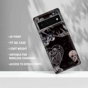 May include: Black phone case featuring a graphic print of skeletons and hearts. The case is compatible with wireless charging and has access to device ports.