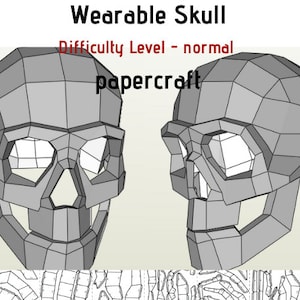 May include: A gray papercraft skull model, designed to be worn as a mask. The model is shown from the front and side views. The text "Wearable Skull" and "Difficulty Level - normal" is displayed above the model. The text "papercraft" is displayed below the model.