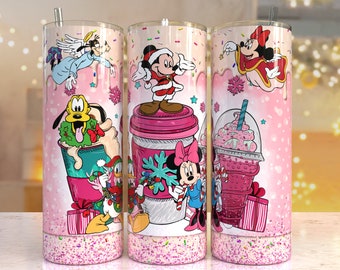 May include: Three pink and white Christmas themed tumblers featuring images of Mickey Mouse, Minnie Mouse, and Goofy. The tumblers have a glitter finish and are decorated with snowflakes, candy canes, and presents.
