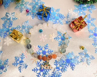 Pulsera de cuentas de cristal con dije de Navidad y triple cuarzo de fuerza