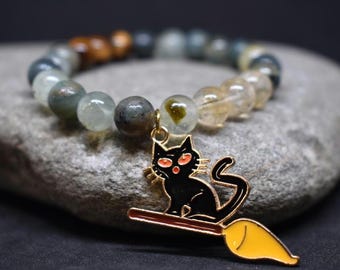 Pulsera con dije de gato místico