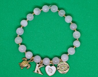 Pulsera con dijes de kunzita: Virgo, Tortuga, Mal de ojo - Cristal del amor